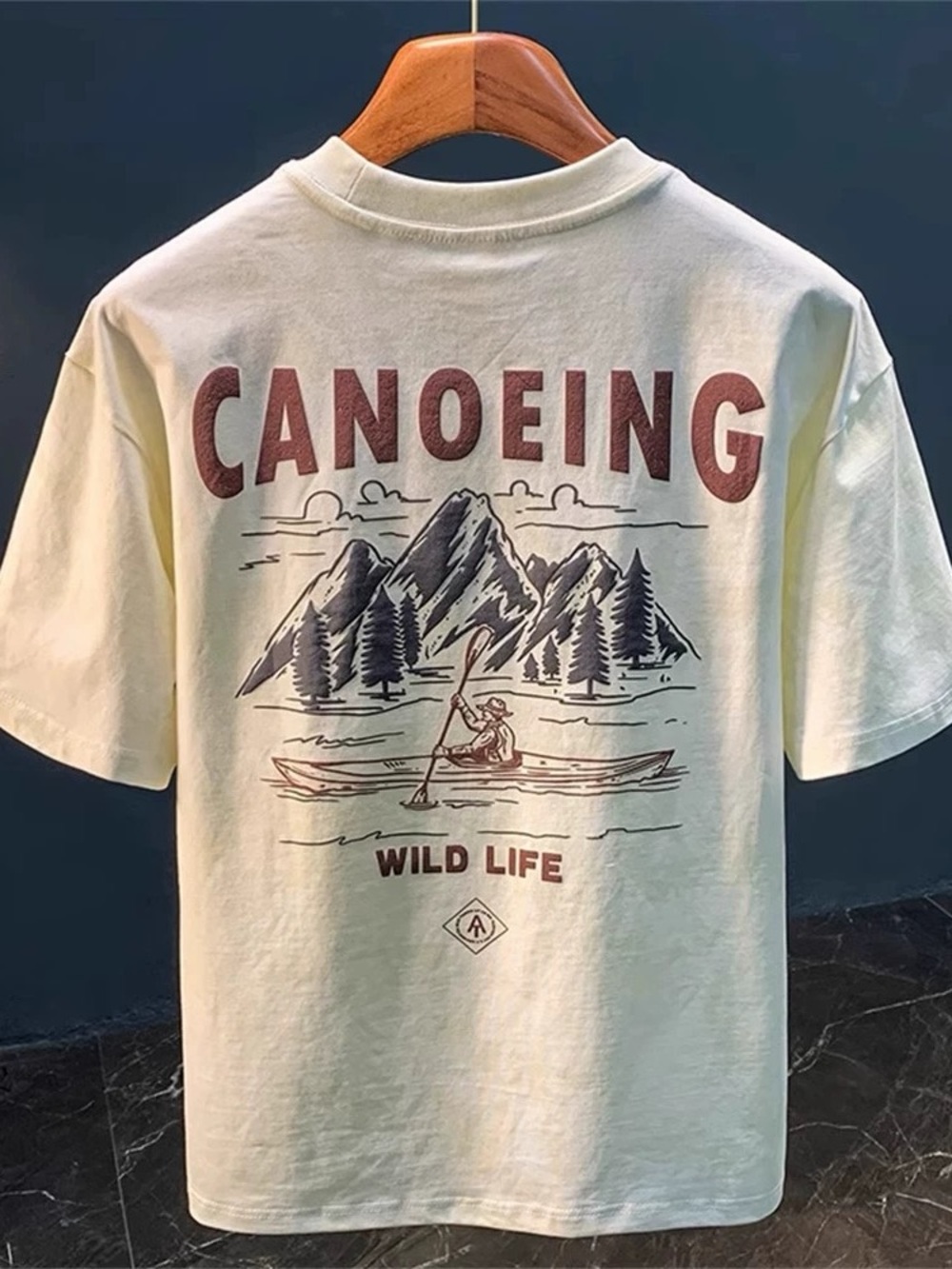 Canoeing Graphic Tee in Cream with Brown & Navy Print
